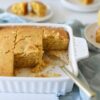 Easy Vegan Cornbread in white dish with gold knife