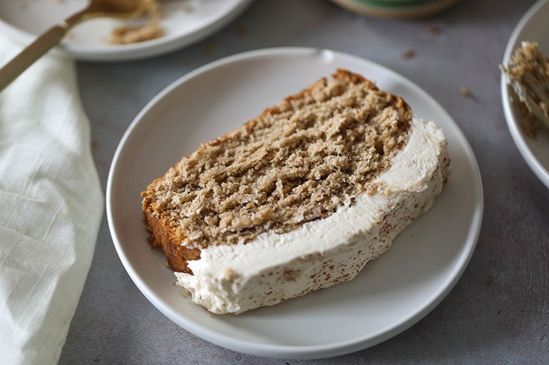 Sliced Vegan Gingerbread Loaf Cake on white plate