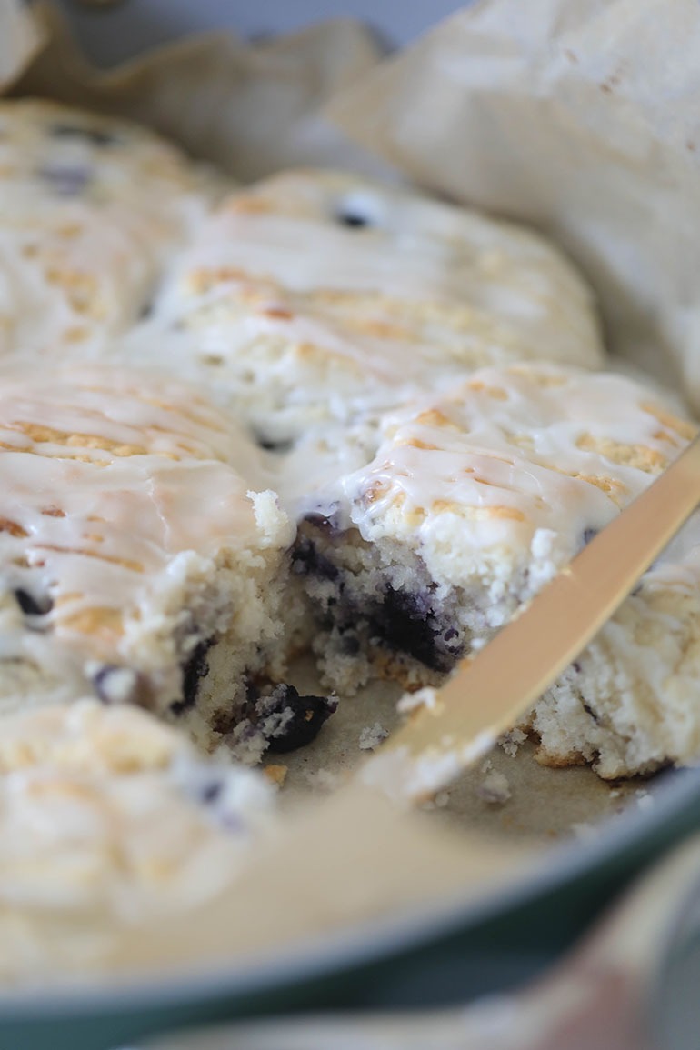 Vegan Blueberry Biscuits in pan with knife