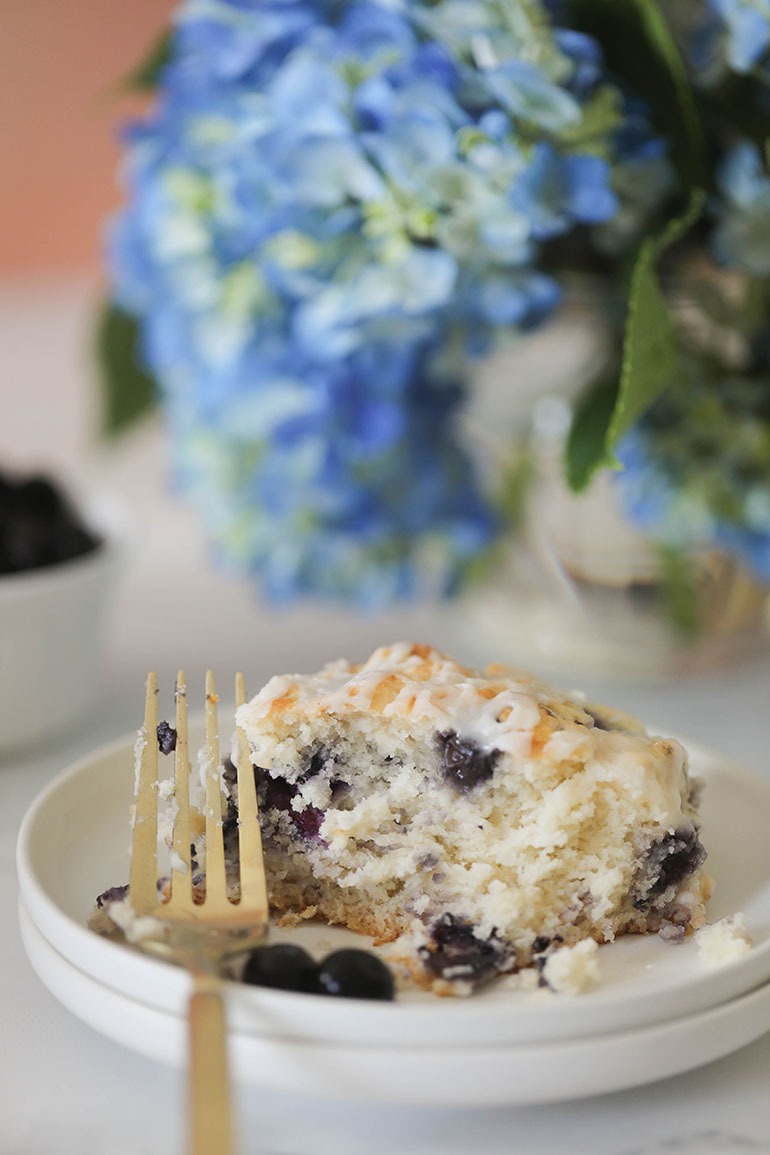 Vegan Blueberry Biscuits on plate with a fork
