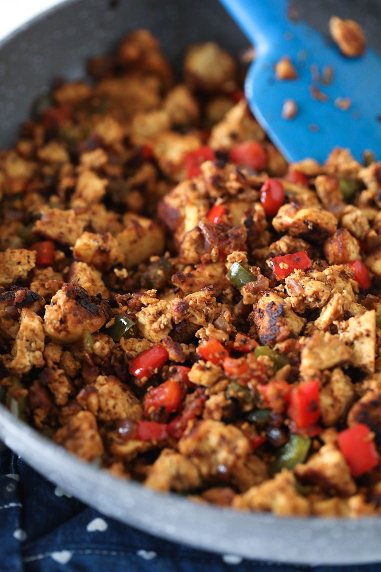Vegan Tofu Quesadilla filling with blue spatula