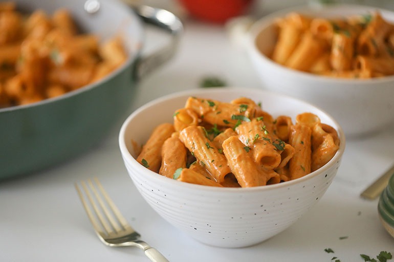 Roasted Red Bell Pepper Pasta in white bowls