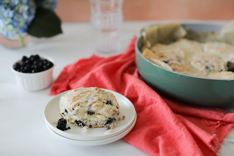 Vegan Blueberry Biscuits on plate and green pan