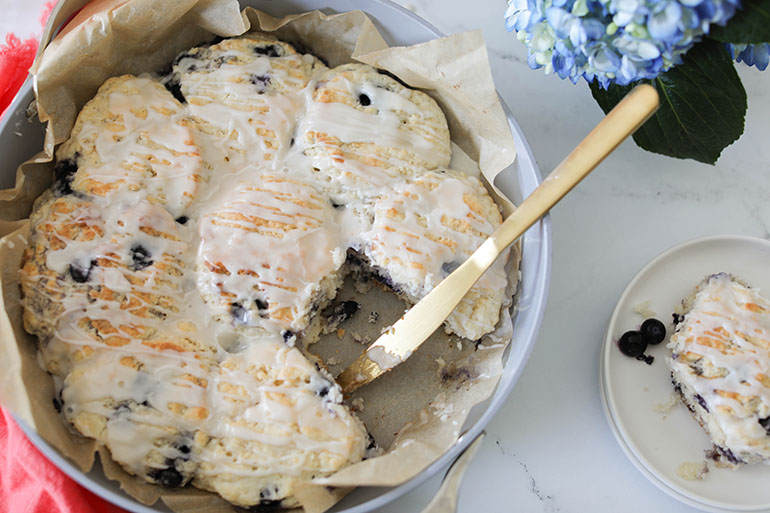 Vegan Blueberry Biscuits in pan with knife
