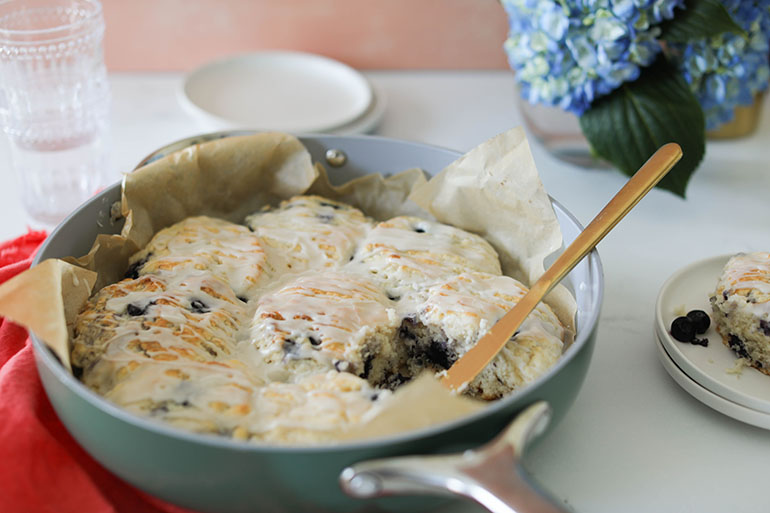 Vegan Blueberry Biscuits on pan with knife