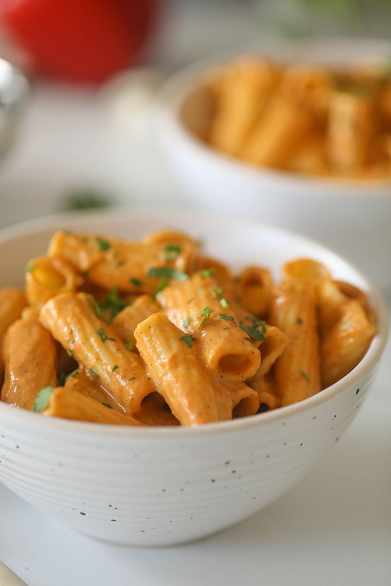 Roasted Red Bell Pepper Pasta in white bowls