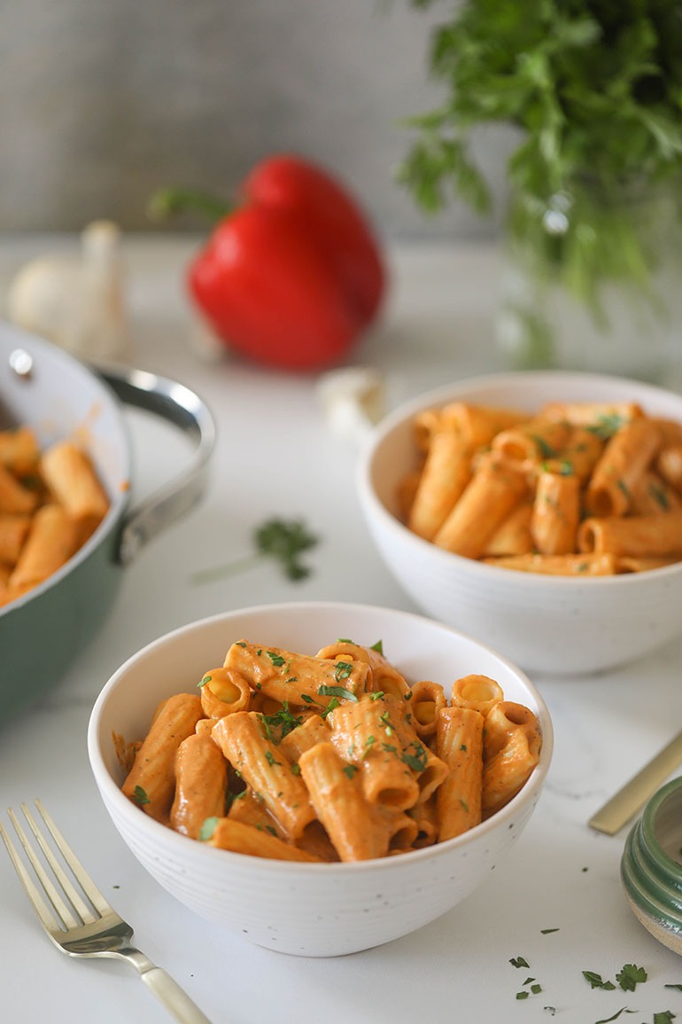 Roasted Red Bell Pepper Pasta in white bowls