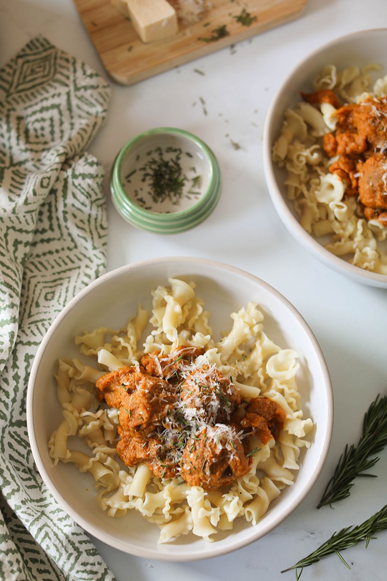 Vegan Pumpkin Meatball Pasta in flat white bowls