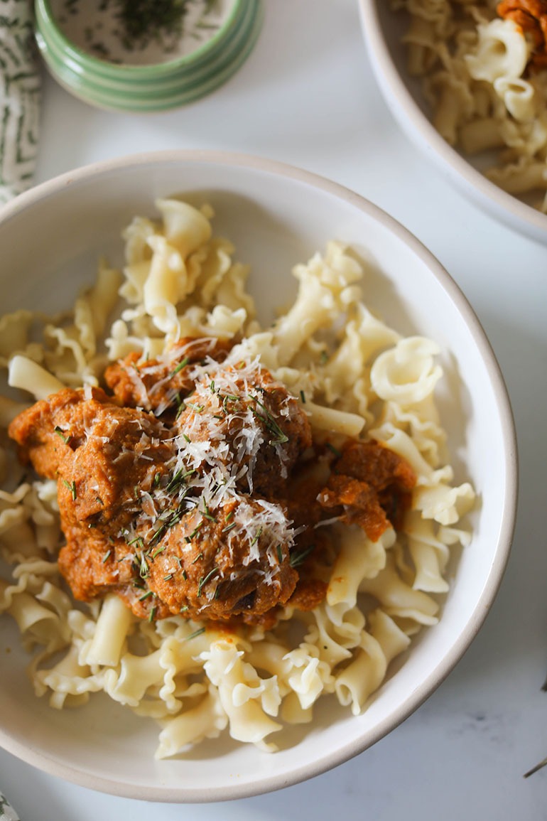 Vegan Pumpkin Meatball Pasta in white bowl