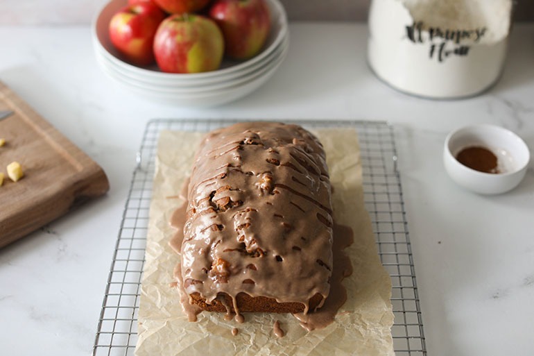 Vegan Cinnamon Apple Bread loaf on wire rack