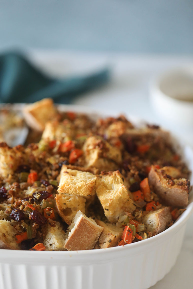 Vegan Sausage Stuffing in white dish