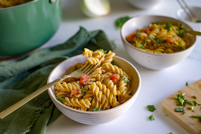 One pot tomato basil pasta in white bowl