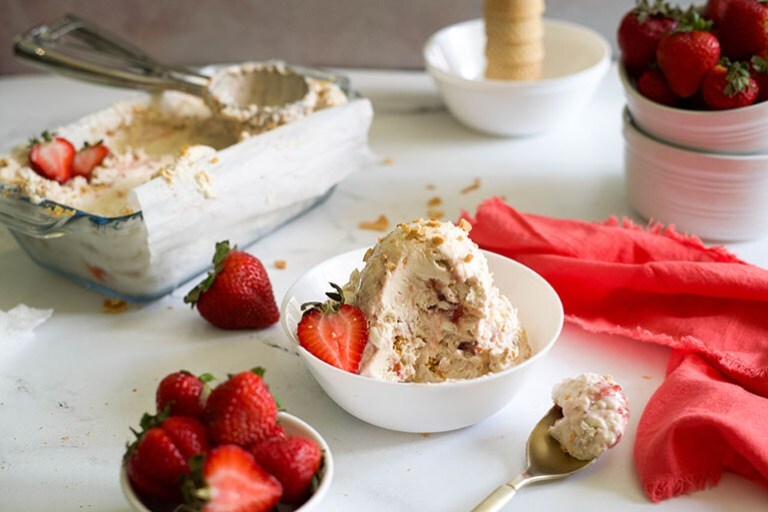Vegan Strawberry Cheesecake Ice Cream in a white bowl