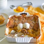 Easy Vegan Peach Cobbler in a white dish