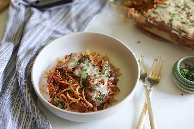 Vegan Baked Spaghetti in flat white bowl
