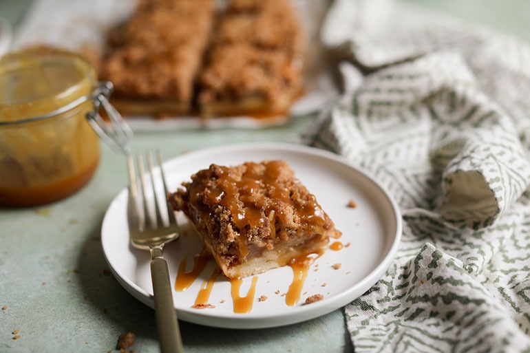 Vegan Caramel Apple Pie Bar on white plate